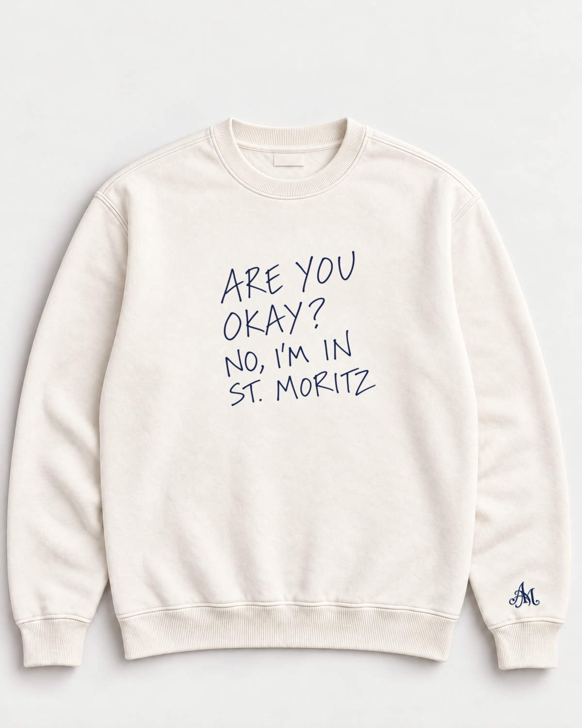Cream crewneck sweatshirt with embroidered Are You Okay? No, I'm In St. Moritz