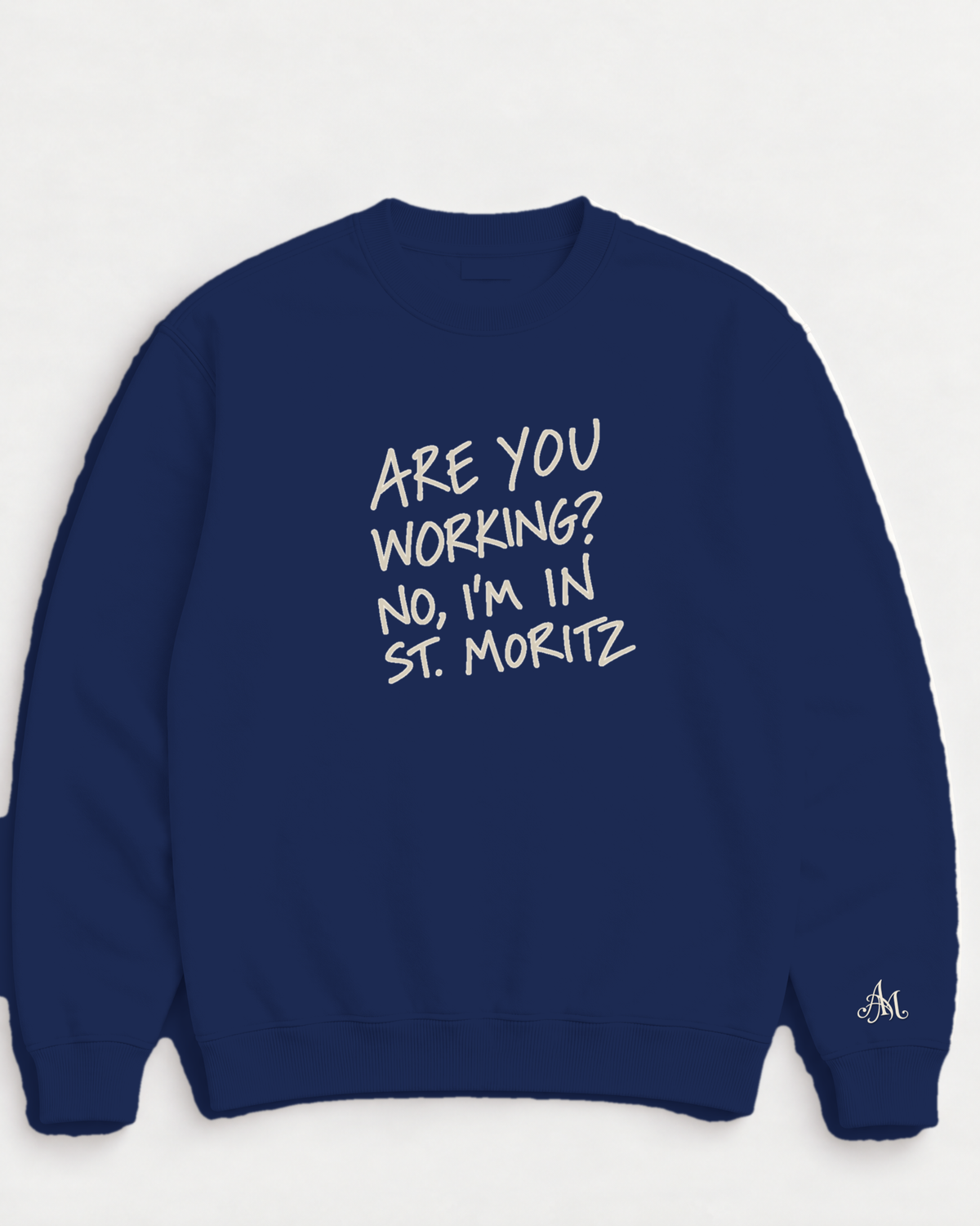 Navy crewneck sweatshirt with embroidered Are You Working? No, I'm In St. Moritz