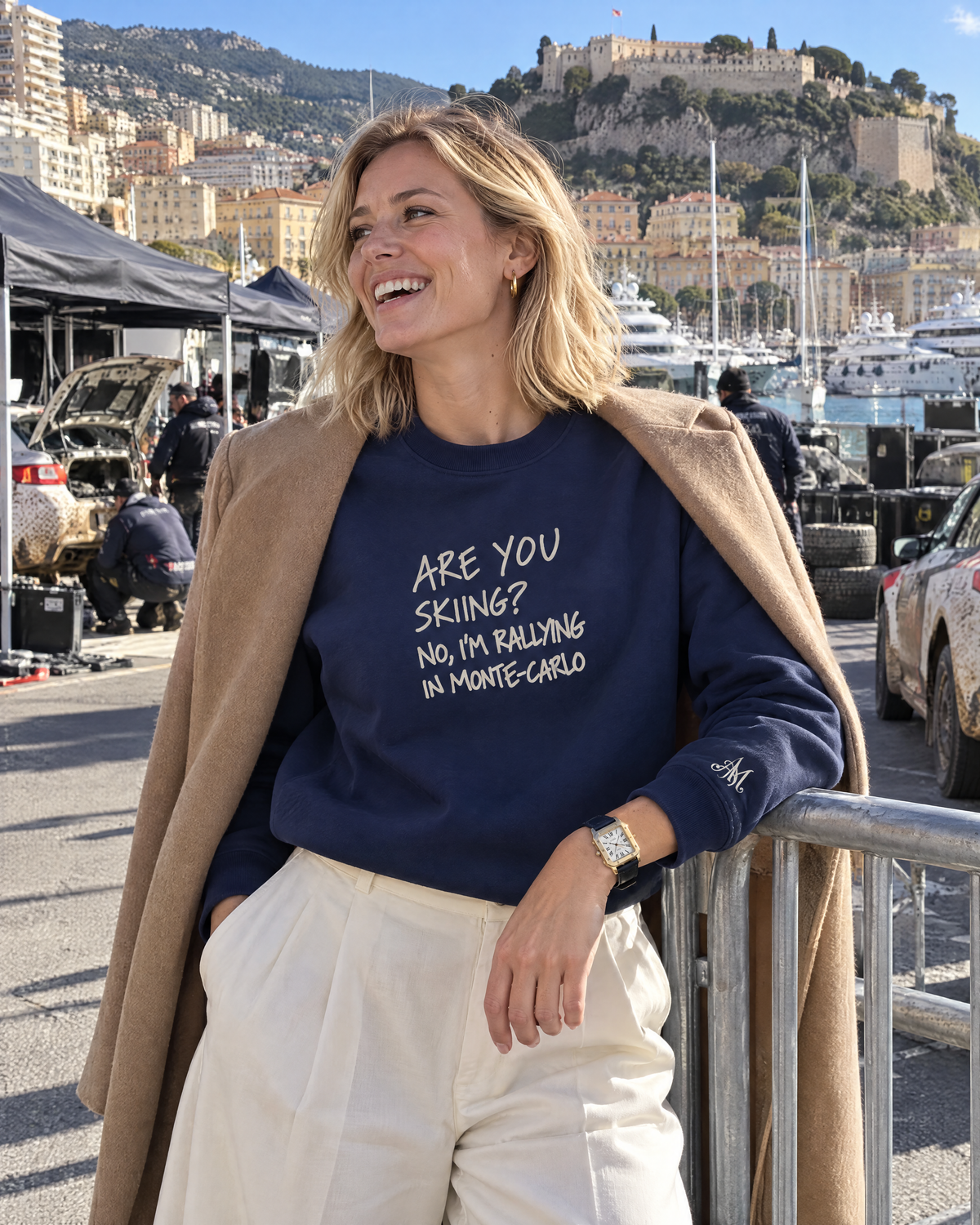 Navy crewneck Are You Skiing? at the rally service park in Port Hercule, Monaco